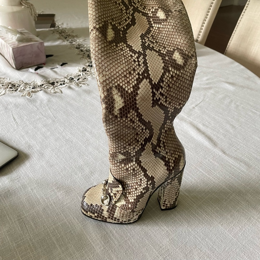 Gucci python  leather boots . Worn once .